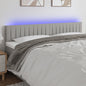 Cabeceira de cama c/luzes LED tecido 160x5x78/88 cm cinza-claro
