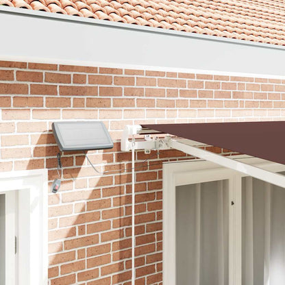 Toldo retrátil manual com luzes LED 300x250 cm castanho